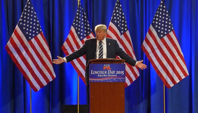 Donald Trump speaks to the media at a Lincoln Day event sponsored in Birch Run, Michigan.