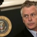 McAuliffe Signs Bill to Let Ex-Officers Be Armed in Schools